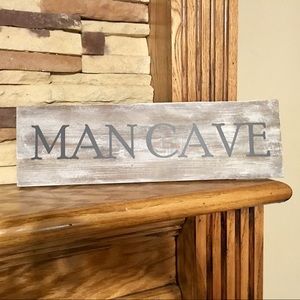 MAN CAVE sign